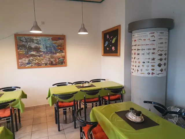 BookNoFees: Restoran – Andy's Fischhütte – Bergkamen – Andyjev riblji kolovrat, fotografija 3