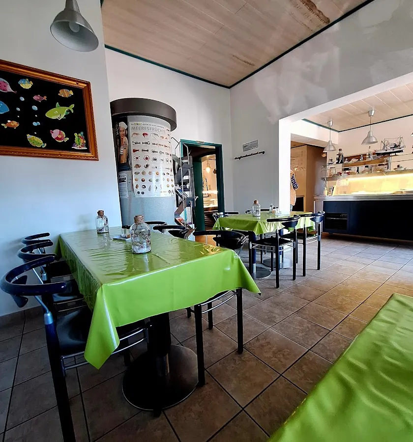 BookNoFees: Restoran – Andy's Fischhütte – Bergkamen – Andyjev riblji kolovrat, fotografija 1